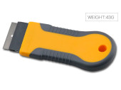 Plastic scraper with retractable blade