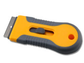 Plastic scraper with retractable blade