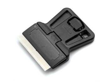 Скребок пластиковий міні з лезом